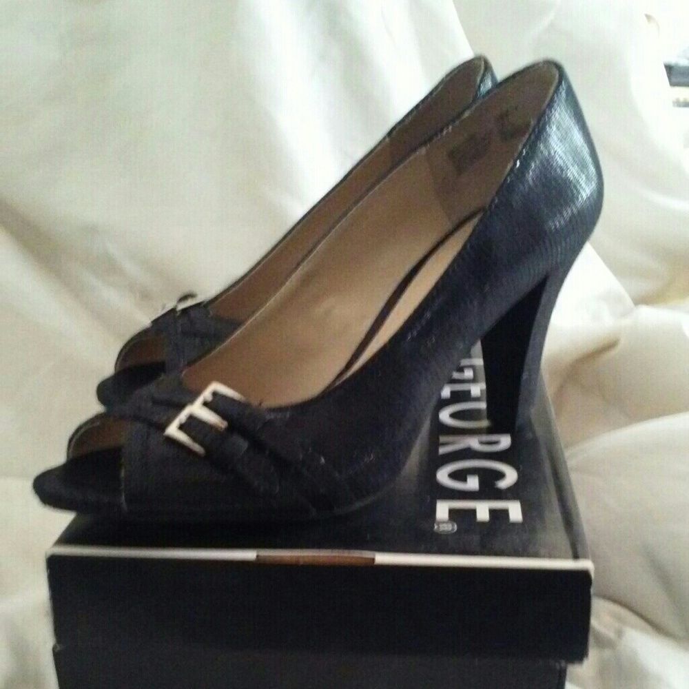 Black peep toed heels.
